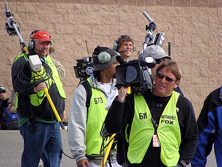 Fox Sports crew covering a NASCAR race