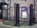 Entrance gates at Stamford House and George House. Late C18. Grade II listed.