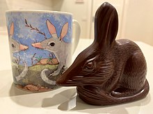 A bilby made of chocolate with other bilbies printed on a mug Haighs Easter Bilby Nicole Kearney.jpg