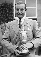 Henry Cotton holding the Claret Jug after winning the 1937 Open Henry Cotton 1937.jpg