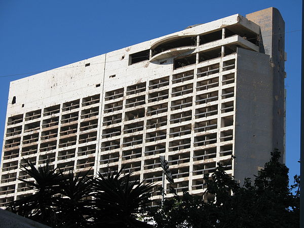 The Holiday Inn Beirut was used as a vantage point for militias and was badly damaged