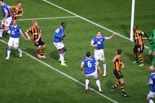 Fryatt (furthest left wearing stripes) on the last day of the 2013–14 Premier League season, facing Everton. Less than a month later, he would sign fo