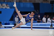 Illia Kovtun performing on floor in the men's artistic individual all-around final on 28 July Illia Kovtun at Tokyo 2020.jpg