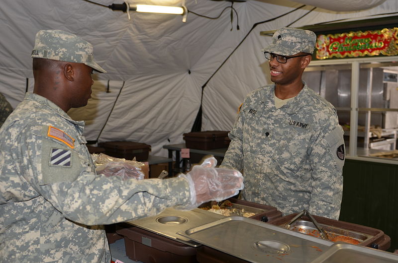 File:In austere environment, cook helps improve morale 141215-A-MK740-001.jpg