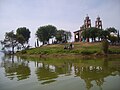 * Nomination Island in Lake Zumpango, Mexico. --Marrovi 05:27, 25 June 2016 (UTC) * Decline Insufficient quality. Loss of fine details, see the branches and the brickwall structure. Probably you will get better results if you develop from RAW. --Cccefalon 06:35, 25 June 2016 (UTC)