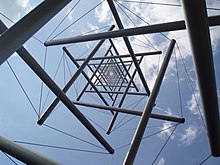 The six-pointed star visible from under Needle Tower II Kenneth Snelson Needle Tower.JPG