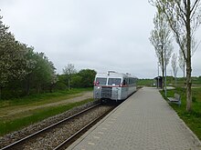 Heritage railcar at Hollose halt in 2015 LNJ SM 13 at Hollose Station.jpg