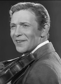 אוטיוסוב בסרט "בחורים שמחים", 1934