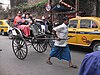 A human-pulled rickshaw in Kolkata