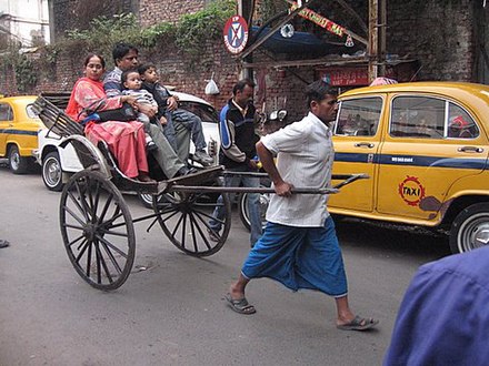 A human-pulled rickshaw in Kolkata