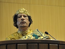 Muammar al-Gaddafi, 12th AU Summit, 090202-N-0506A-534 (cropped)