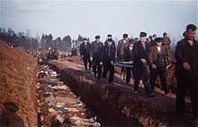 Workers from the town of Nordhausen bury corpses found at Mittelbau-Dora concentration camp in 1945. Nordhausenmassgrave.jpg