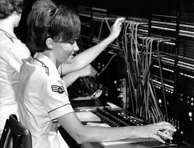 U.S. Air Force operator works a switchboard in the underground command post at Strategic Air Command headquarters, Offutt Air Force Base, Nebraska in 