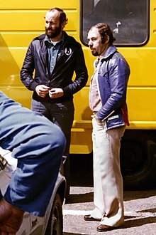 Willi Kauhsen on the right, Henri Pescarolo on the left, at Circuit de Spa-Francorchamps in Belgium in 1975 PescaroloKauhsen1975.jpg