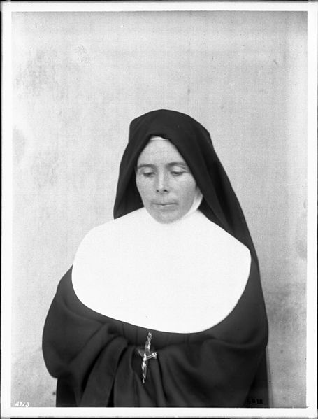 File:Portrait of a sister with downcast eyes at Mission San Carlos Borromeo, Monterey, ca.1906 (CHS-4113).jpg