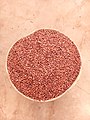 Processed millet or red sorghum
