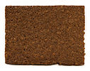 A slice of pumpernickel rye bread