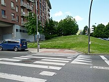 Raised crosswalk with no sidewalk to right (18824437421).jpg