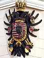 Rakouský orel se znakem Českého království (na domě na Křižovnickém náměstí v Praze)