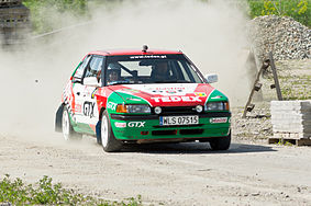 Polski: Wyścig VII Rally Piaseczno 2012, OS Gąski, Mazda 323, nr startowy 4, kierowca Mariusz Walczak, pilot Anna Bruc.