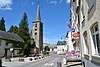 Rue de Luxembourg in Consdorf with the church on the left and a restaurant on the right