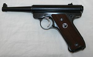 https://upload.wikimedia.org/wikipedia/commons/thumb/5/5d/Ruger_Standard_Pistol_wood_grips.jpg/300px-Ruger_Standard_Pistol_wood_grips.jpg