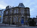 The library on the High Street, Sandown, Isle of Wight. From 31 March 2011, nine of the eleven libraries on the island were closed by the Isle of Wight Council, leaving only Newport and Ryde to save money after cuts in funding from central government.