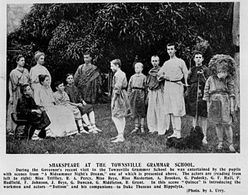 Robin Starveling as Moonshine (second from right), with thorn-bush and dog, in a 1907 student production StateLibQld 1 197547 Students from Townsville Grammar School performing A Midsummer Night's Dream, 1907.jpg