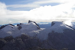 Sumantri (center) with Ngga Pulu (right) from Carstensz Summit by Christian Stangl flickr.jpg