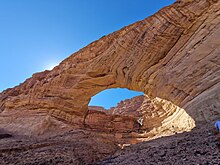 Arco Naturale“ is a natural limestone arch that forms a bridge between two  pillars of rock.