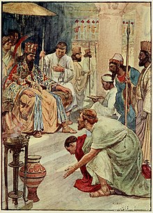 Photographie en couleurs d'un dessin d'illustration : Thémistocle, à droite et à genoux, se présente devant le souverain de la cour perse, assis et entouré de sa cour.