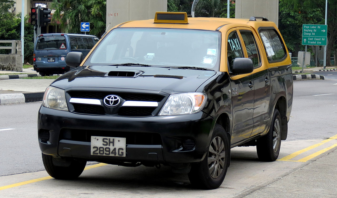 Image of Toyota Hilux Yellow Top Cab