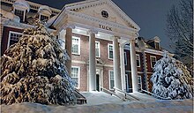 Tuck Hall, the Tuck School's main administrative building, after a heavy snowfall Tuck Admissions.jpg