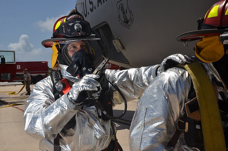 File:U.S. Air Force Tech. Sgt. Arnold Castro, left, a station captain with the 36th Civil Engineer Squadron Fire and Emergency Services Flight, participates in an aircraft fire training exercise April 4, 2013 130404-F-OG799-069.jpg