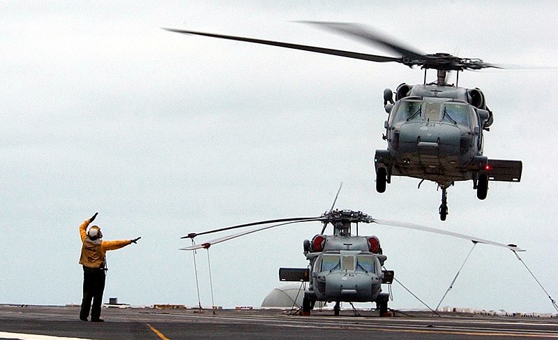 File:US Navy 050530-N-7130B-121 An aircraft director signals an MH-60S Knighthawk to depart flight deck aboard the Nimitz class aircraft carrier USS Ronald Reagan (CVN 76).jpg
