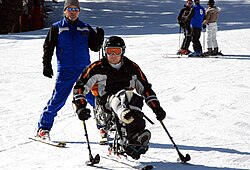 A disabled veteran uses a sit ski at Vail, Colorado. Vail Veterans monoski.jpg