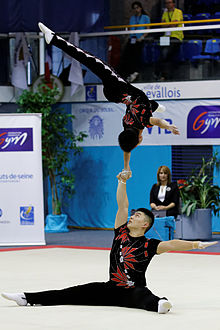 Li Ziyang (top) and Zhang Shaolong at the 2014 Acrobatic Gymnastics World Championships. 2014 Acrobatic Gymnastics World Championships - Men's pair - Finals - China 03.jpg