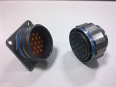 A MIL-DTL-38999 circular connector plated with a nickel-teflon composite. Left: plug (male) type connector; Right: receptacle (female) type connector) 38999 connector nickel-teflon.jpg