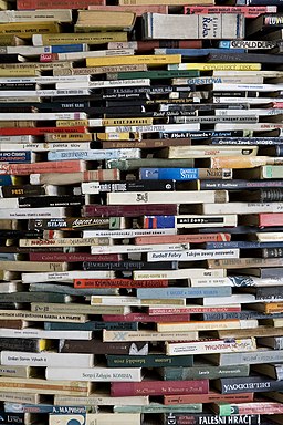 A tower of used books - 8447