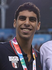 عبد الرحمن سامح، بطل العالم للسباحة لعام 2023 في منافسات سباق 50 متر فراشة.