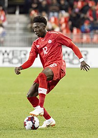 Alphonso Davies för Kanadas landslag 2018.