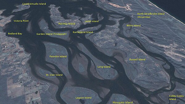 Satellite view from the southwest of Southern Moreton Bay, Queensland – labelled are the many islands created from the outflow of the Logan River behi