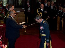 Ferguson's investiture as a Knight Companion of the New Zealand Order of Merit by the governor-general, Sir Anand Satyanand, in 2009 Bruce Ferguson KNZM investiture.jpg