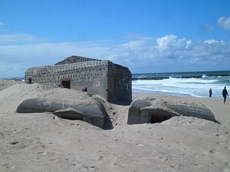 Bunker remnants from WWII in Thyboron. German fortifications remain along the entire west coast of Jutland. Bunker verschoben - panoramio.jpg