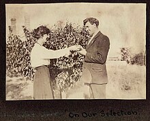 1920s photograph of Christian and Napier Waller with fruit tree. Card inscribed "On Our selection" under image, and on front: "Best Wishes to J. B. Trinick". Courtesy University of Melbourne Archives Christian and Napier Waller c1930.jpg