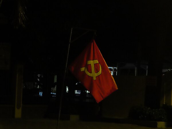 Communist flag at night at Ho Chi Minh City, Vietnam, year 2024