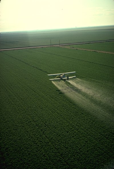 Cropduster spraying pesticides.jpg