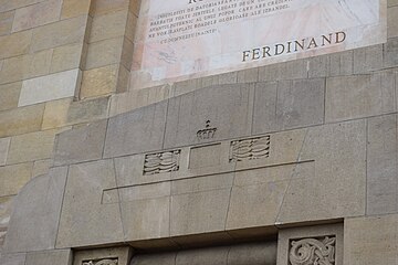 The symbol of the Royal Crown (the Romanian "Steel Crown"), depicted on the Eastern façade