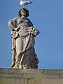 Statue of Demeter above corn exchange facade