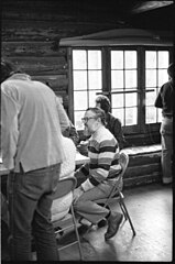 Ritchie engaged in conversation in a chalet in the mountains surrounding Salt Lake City at the 1984 Usenix conference.